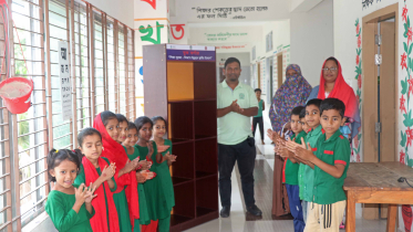 ভোলায় ২০ শিক্ষাপ্রতিষ্ঠানে বুক কর্নার স্থাপনে বুকশেলফ বিতরণ